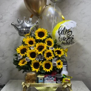 Desayuno sorpresa con girasoles y globos con helio