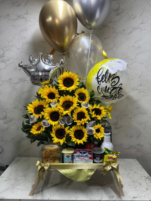 Desayuno sorpresa con girasoles y globos con helio