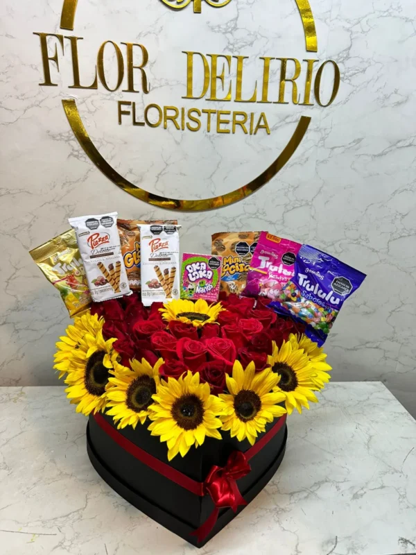 Caja corazon con rosas, girasoles y dulces