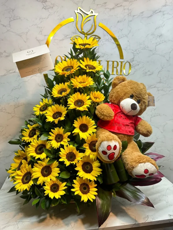 Arreglo floral en girasoles con peluche